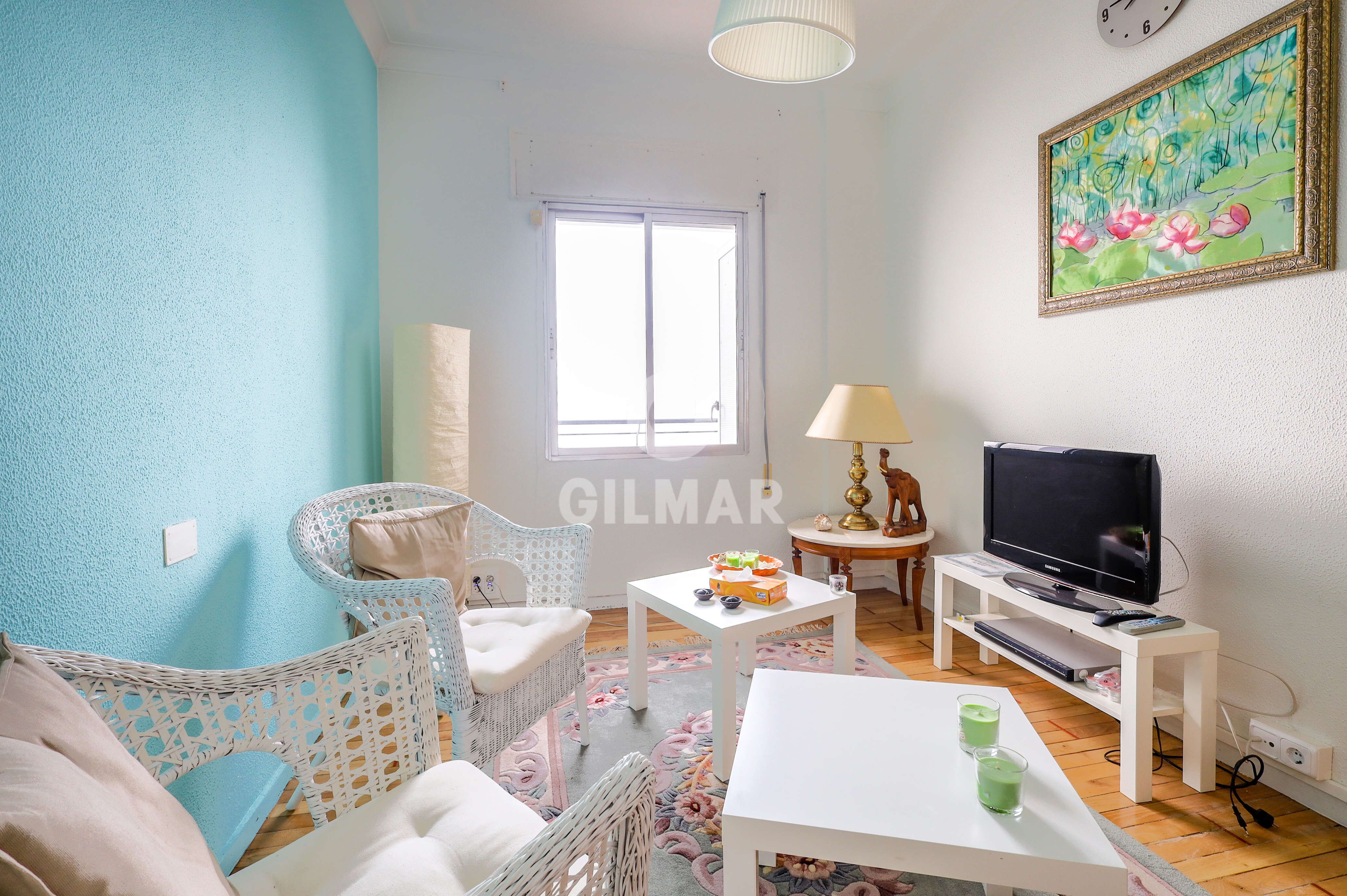 Living room of Flat for sale in  Madrid Capital  with Heating and Balcony