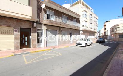 Exterior view of House or chalet for sale in Guardamar del Segura  with Air Conditioner, Terrace and Storage room