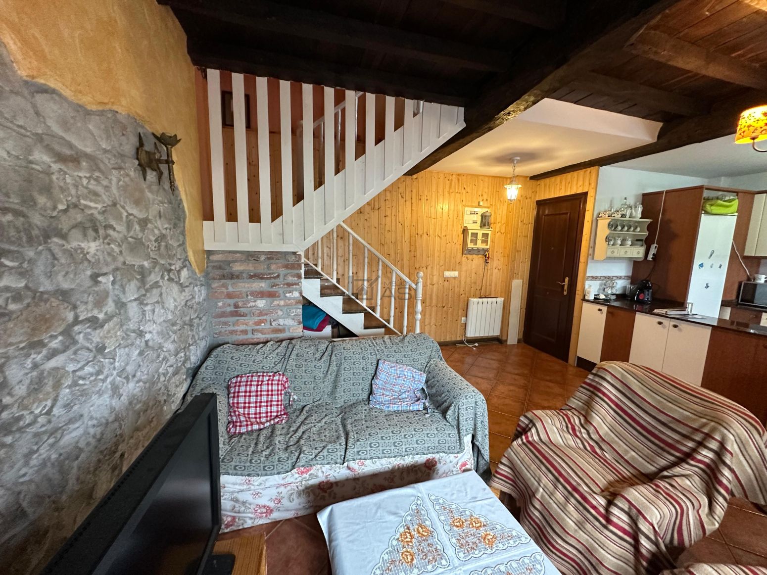 Sala d'estar de Casa adosada en venda en Pravia amb Calefacció, Parquet i Traster