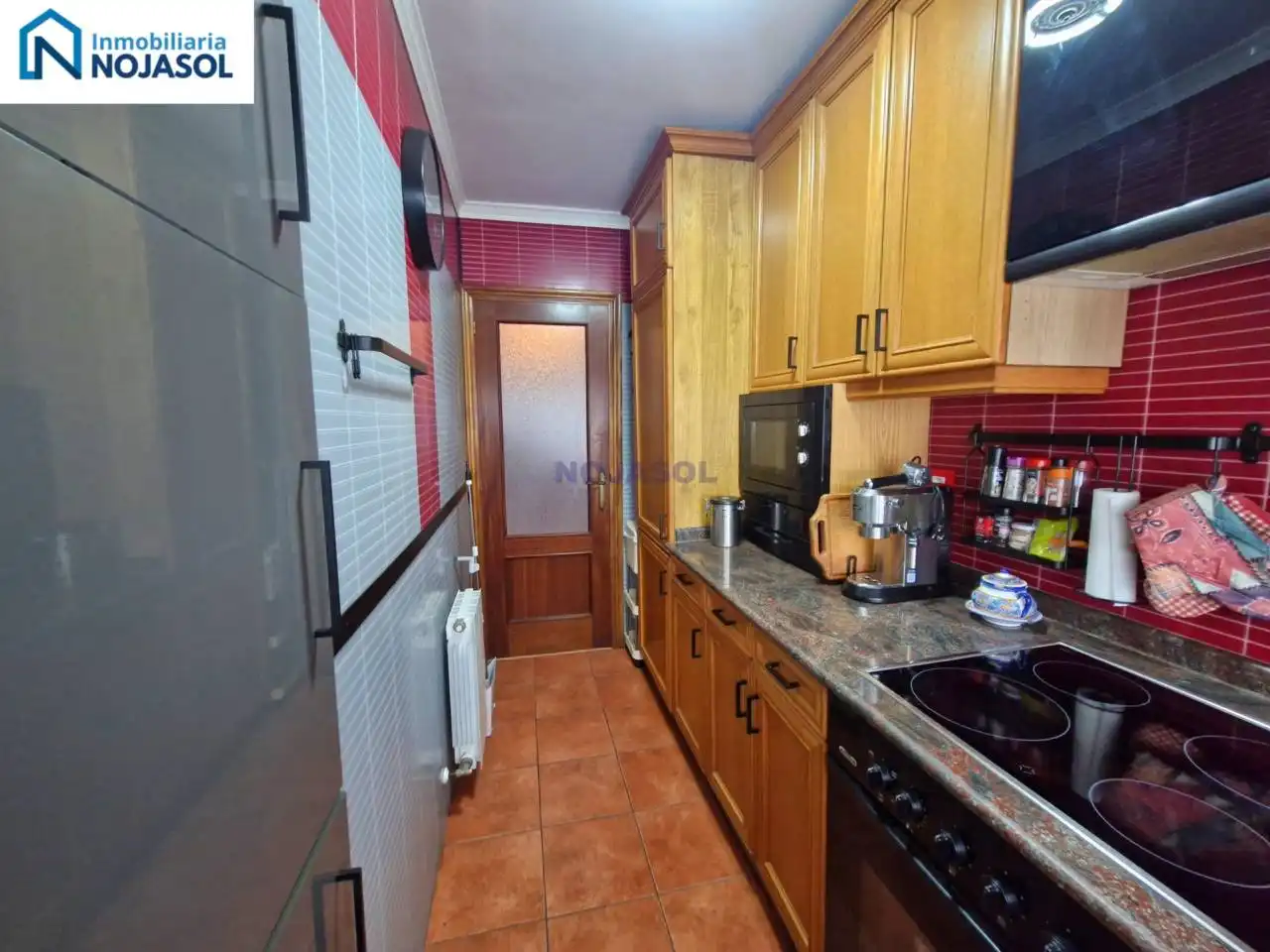 Cuina de Apartament en venda en Noja amb Calefacció, Terrassa i Moblat
