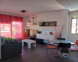 Sala d'estar de Casa adosada de lloguer en Oliva amb Aire condicionat i Terrassa