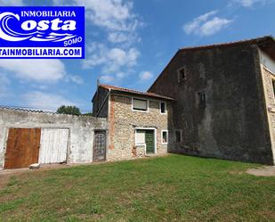 Vista exterior de Casa o xalet en venda en Ribamontán al Mar amb Jardí privat i Balcó