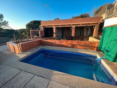 Swimming pool of House or chalet for sale in Gelida  with Air Conditioner, Heating and Storage room