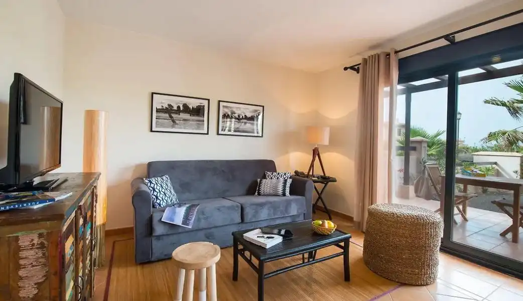 Sala d'estar de Casa adosada en venda en La Oliva amb Terrassa, Moblat i Piscina comunitària