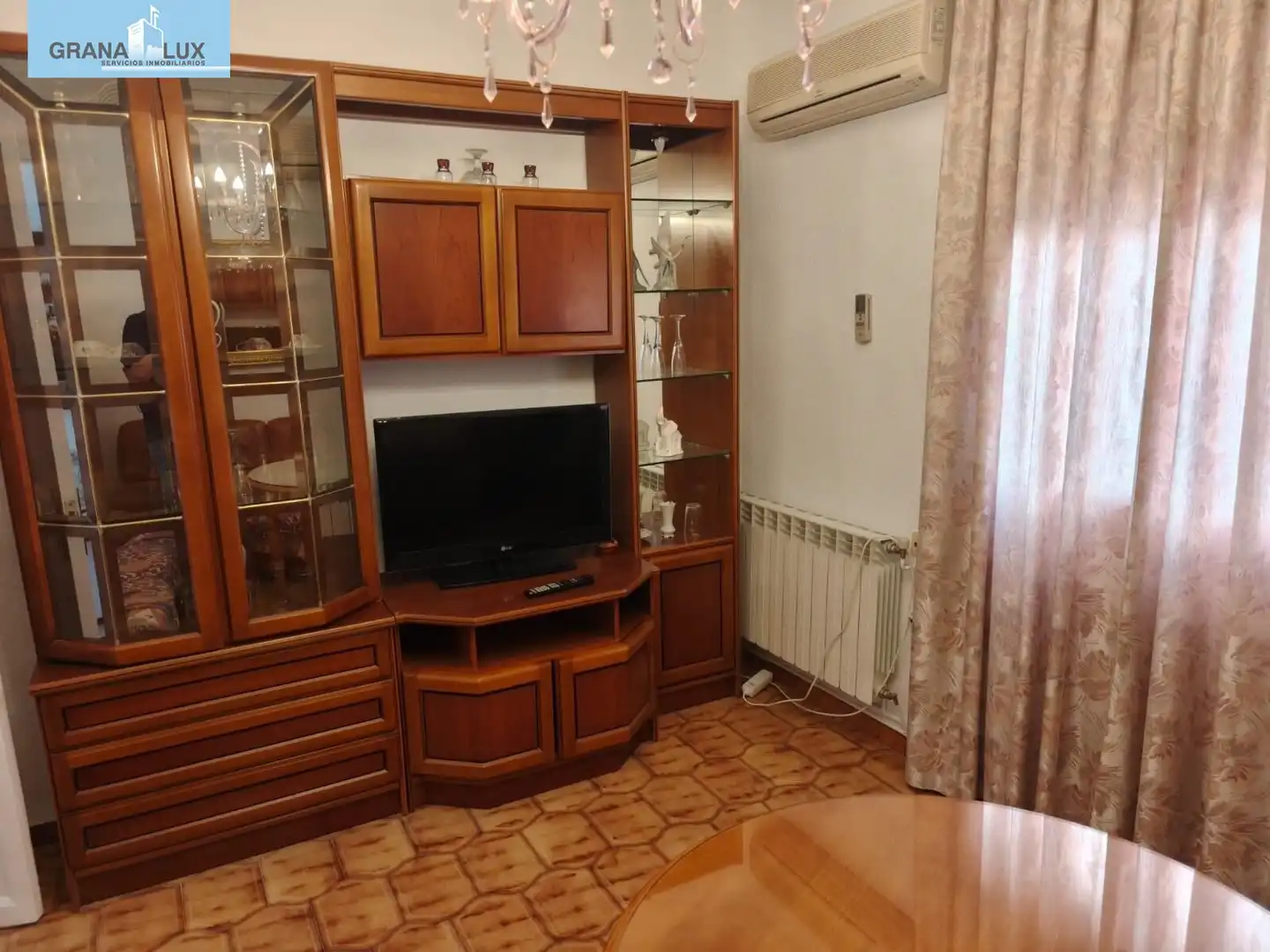 Wohnzimmer von Wohnung zur Miete in Genil