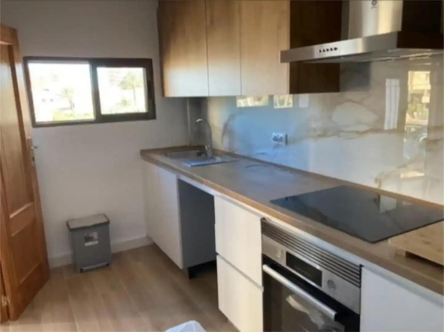 Cuina de Planta baixa de lloguer en La Manga del Mar Menor amb Aire condicionat, Piscina i Moblat