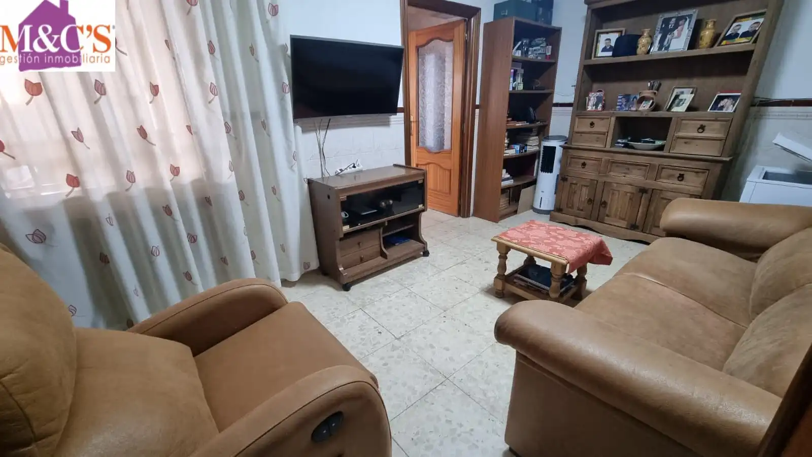 Sala d'estar de Casa o xalet en venda en Puertollano amb Aire condicionat, Terrassa i Traster