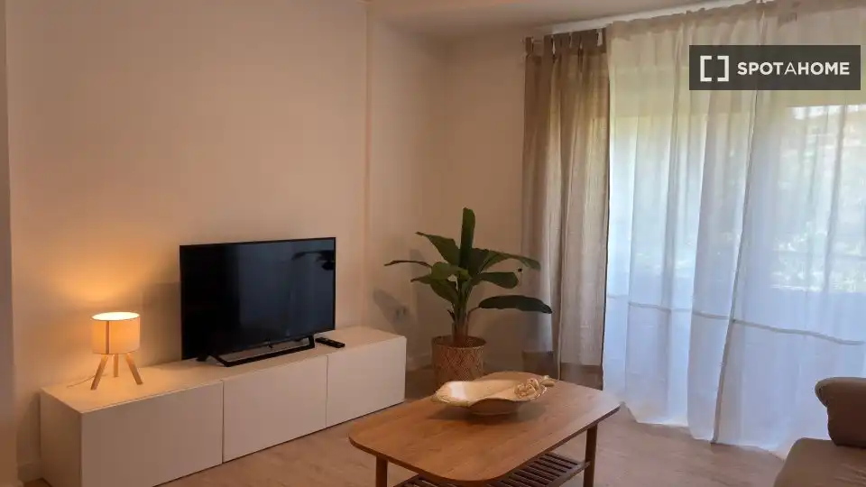 Sala de estar de Apartamento para compartir en Valencia con Aire acondicionado, Terraza y Amueblado