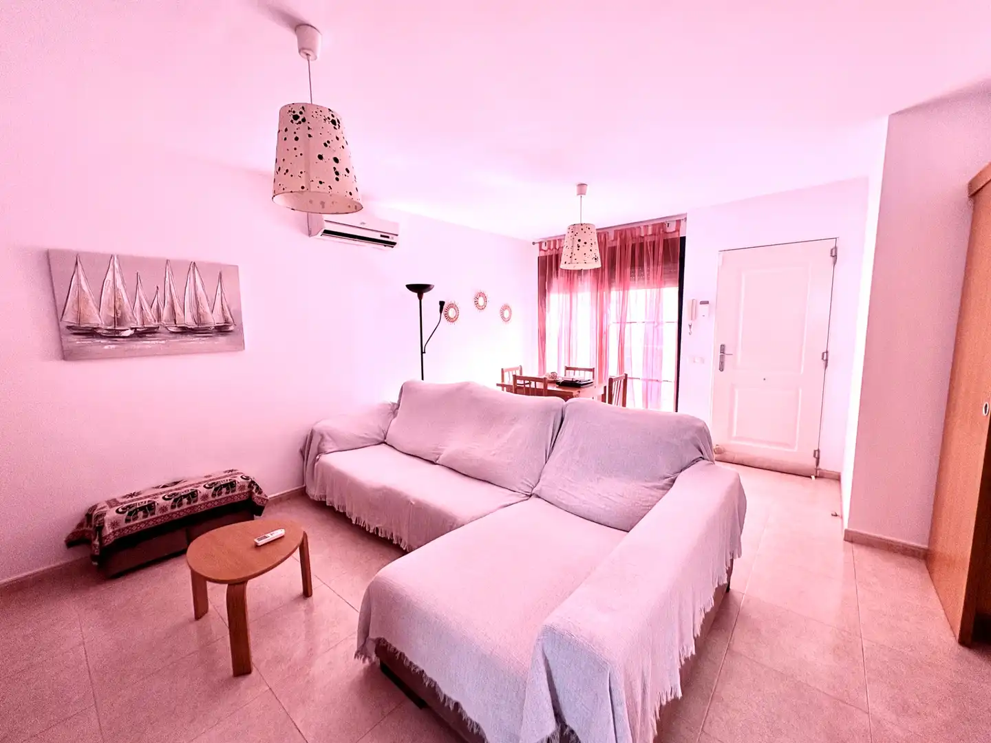 Sala d'estar de Casa adosada de lloguer en Sant Jaume d'Enveja amb Aire condicionat, Terrassa i Moblat