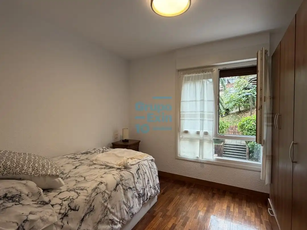 Schlafzimmer von Wohnung zur Miete in Antiguo