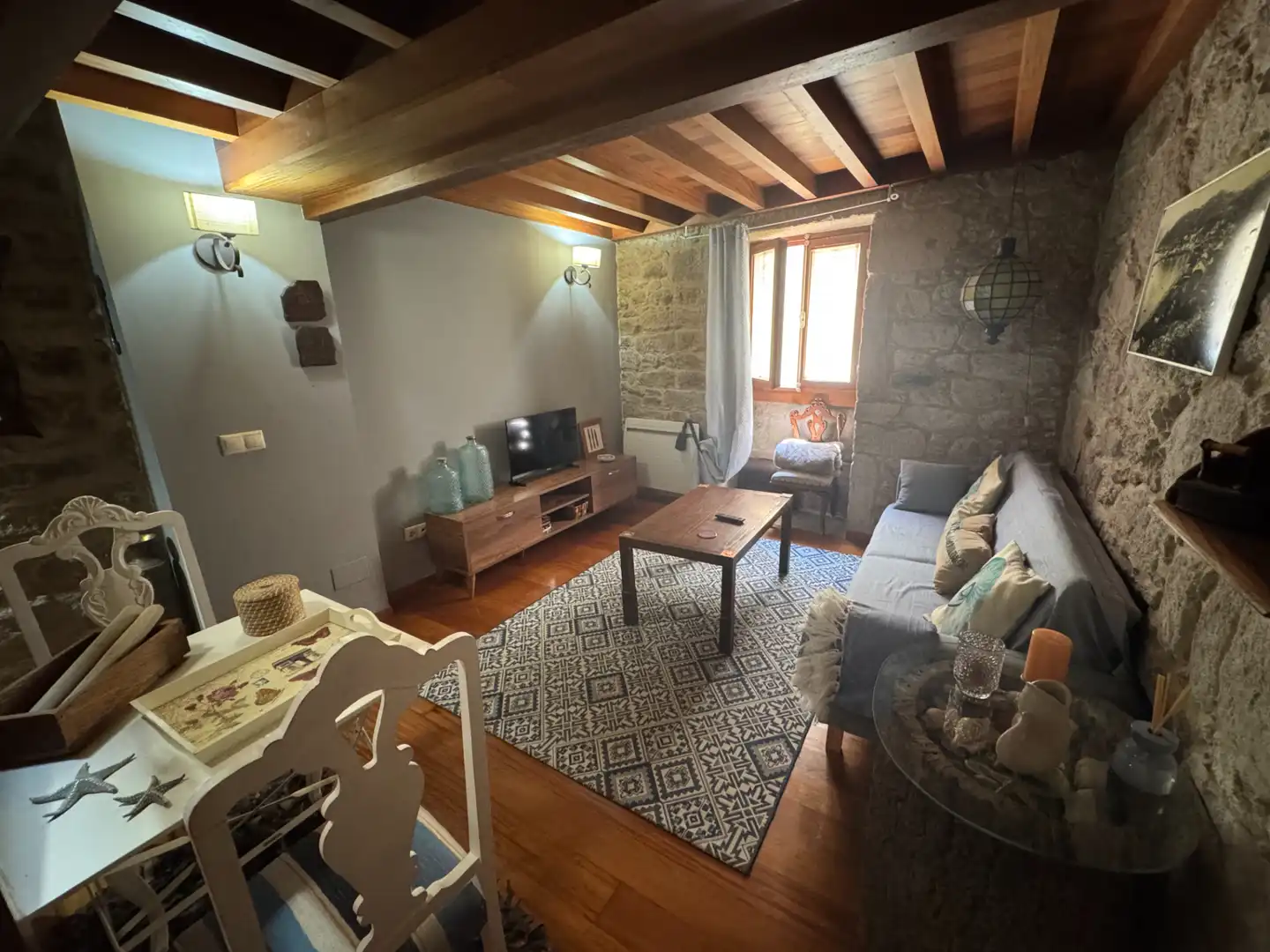 Sala d'estar de Casa o xalet en venda en Muros amb Moblat
