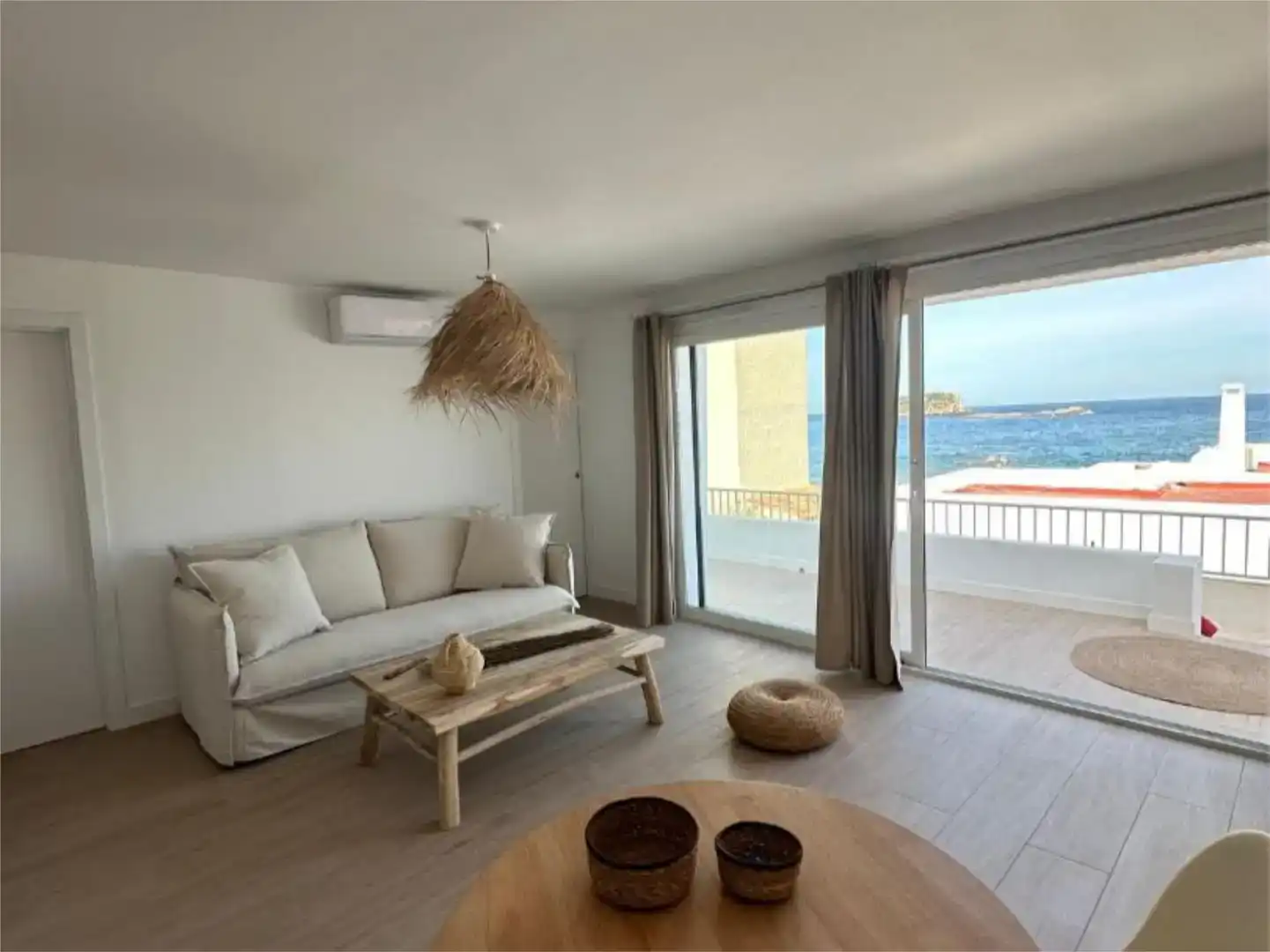 Sala d'estar de Pis de lloguer en Santa Eulària des Riu amb Aire condicionat, Parquet i Moblat