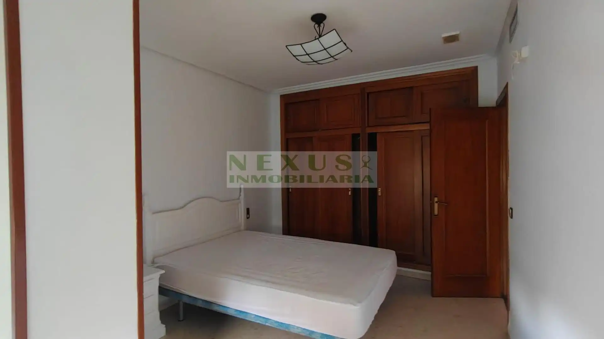 Dormitori de Apartament de lloguer en Cáceres amb Aire condicionat, Calefacció i Terrassa