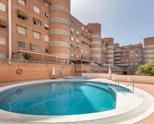 Swimming pool of Flat for sale in  Granada Capital  with Air Conditioner, Heating and Parquet flooring