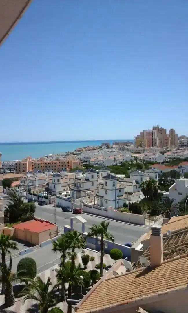 Exterior view of Attic for sale in Torrevieja  with Air Conditioner, Swimming Pool and Balcony