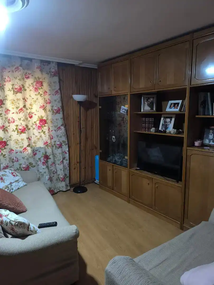 Sala d'estar de Casa adosada en venda en Baltanás amb Parquet, Traster i Moblat