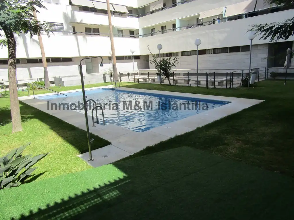 Piscina de Piso en venta en Isla Cristina con Terraza, Horno y Lavadora
