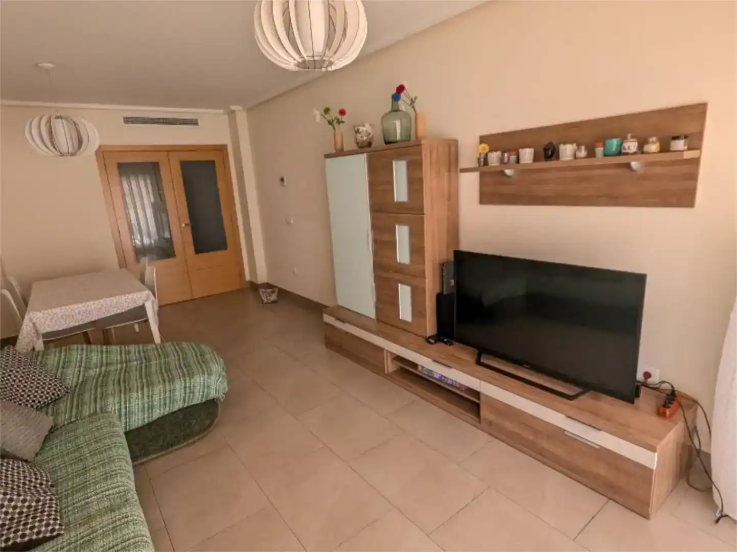 Sala d'estar de Planta baixa de lloguer en Dénia amb Aire condicionat, Piscina i Moblat