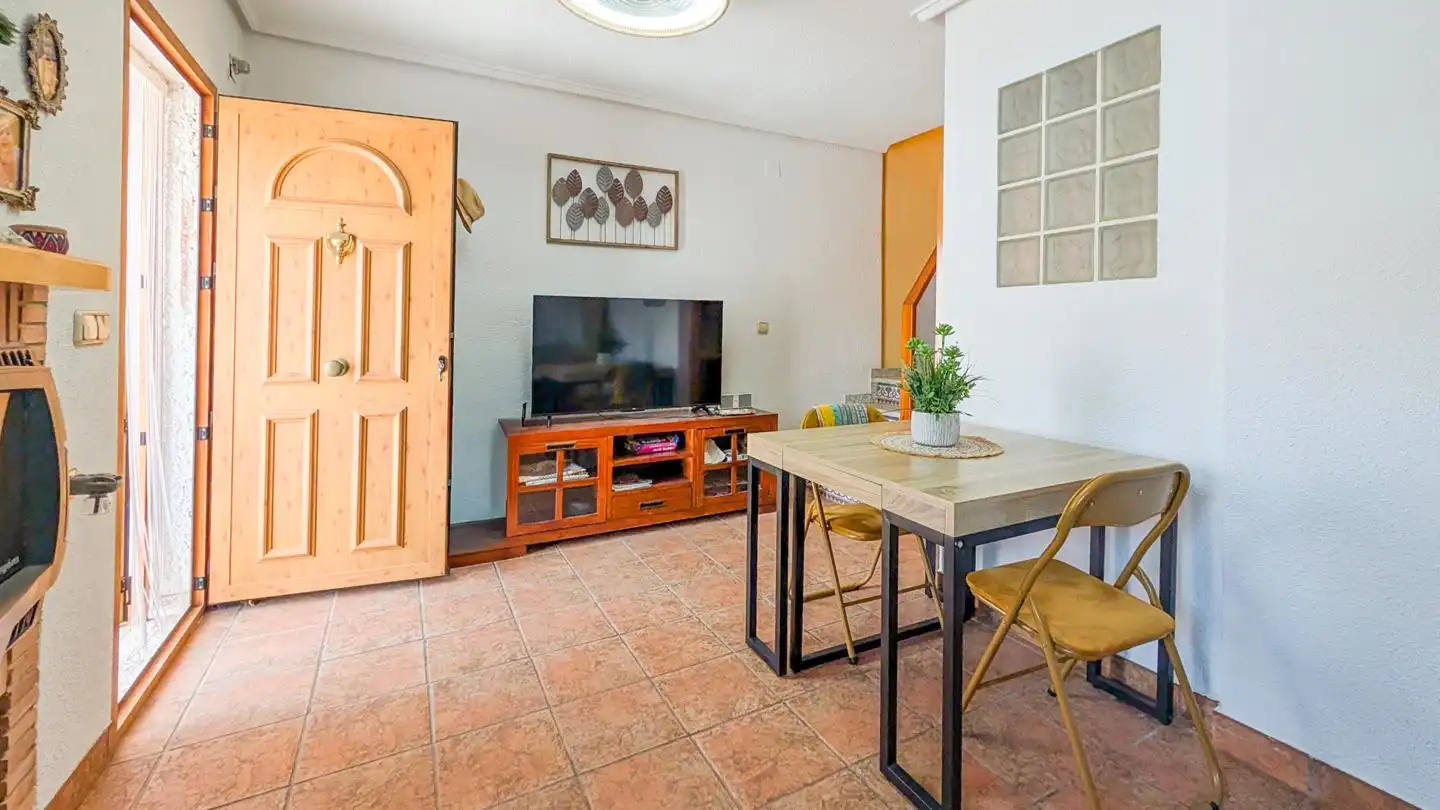 Sala de estar de Casa adosada en venta en Santa Pola con Aire acondicionado, Terraza y Amueblado