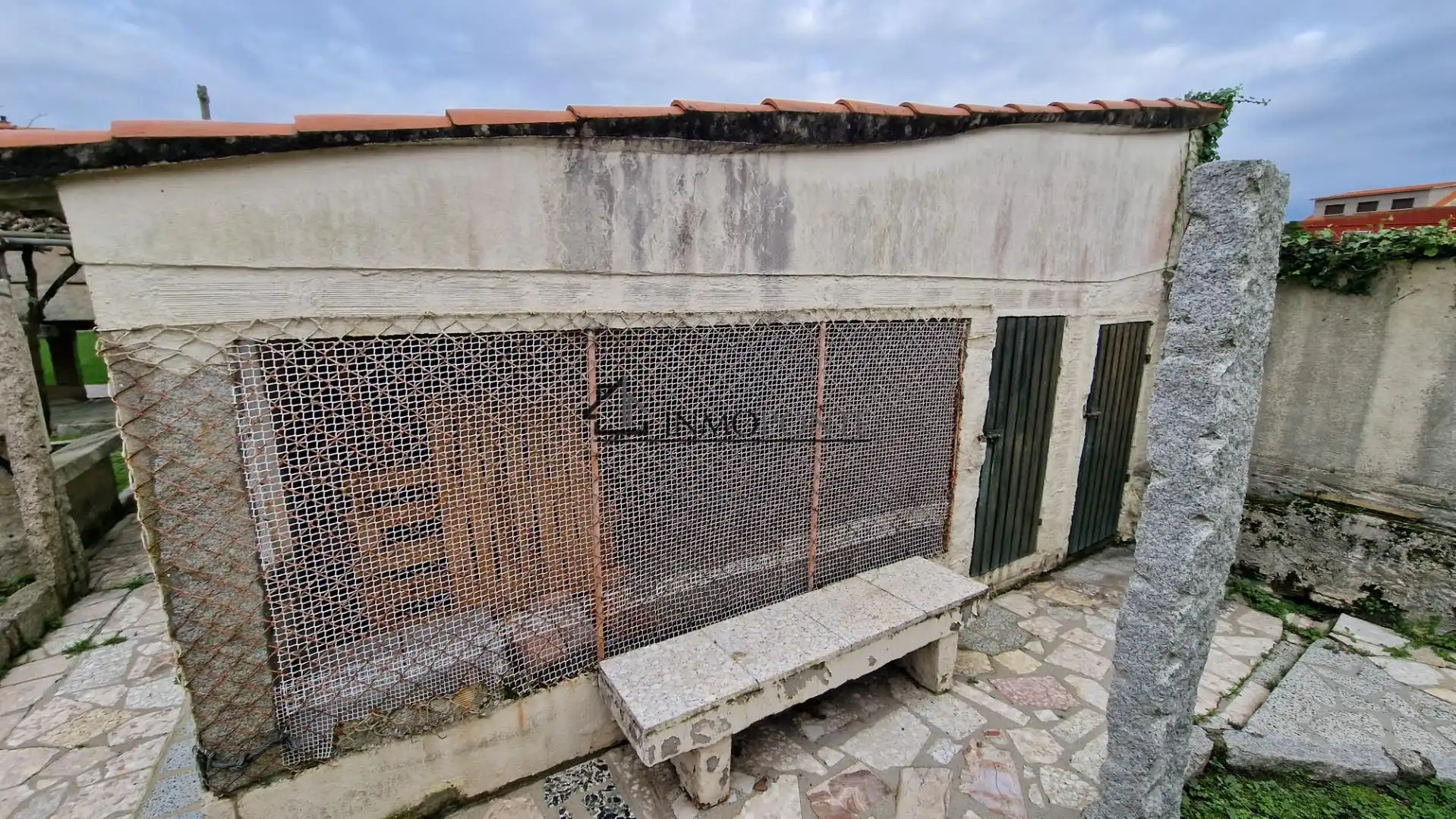 Vista exterior de Casa adosada en venda en O Grove   amb Calefacció, Jardí privat i Traster