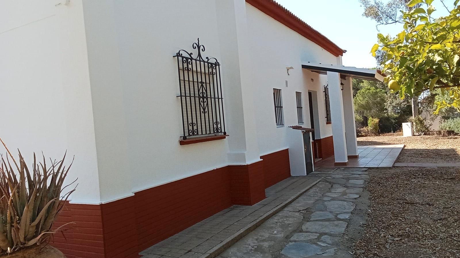 Vista exterior de Casa o xalet en venda en Valverde del Camino amb Jardí privat, Traster i Alarma