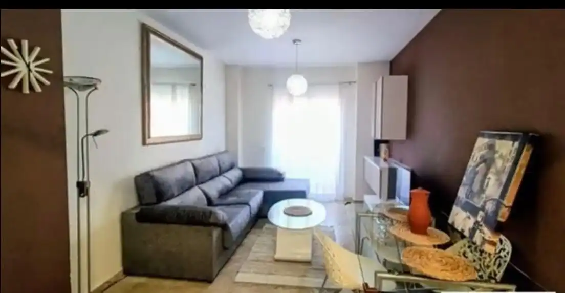 Sala d'estar de Apartament en venda en Manilva amb Aire condicionat, Terrassa i Traster
