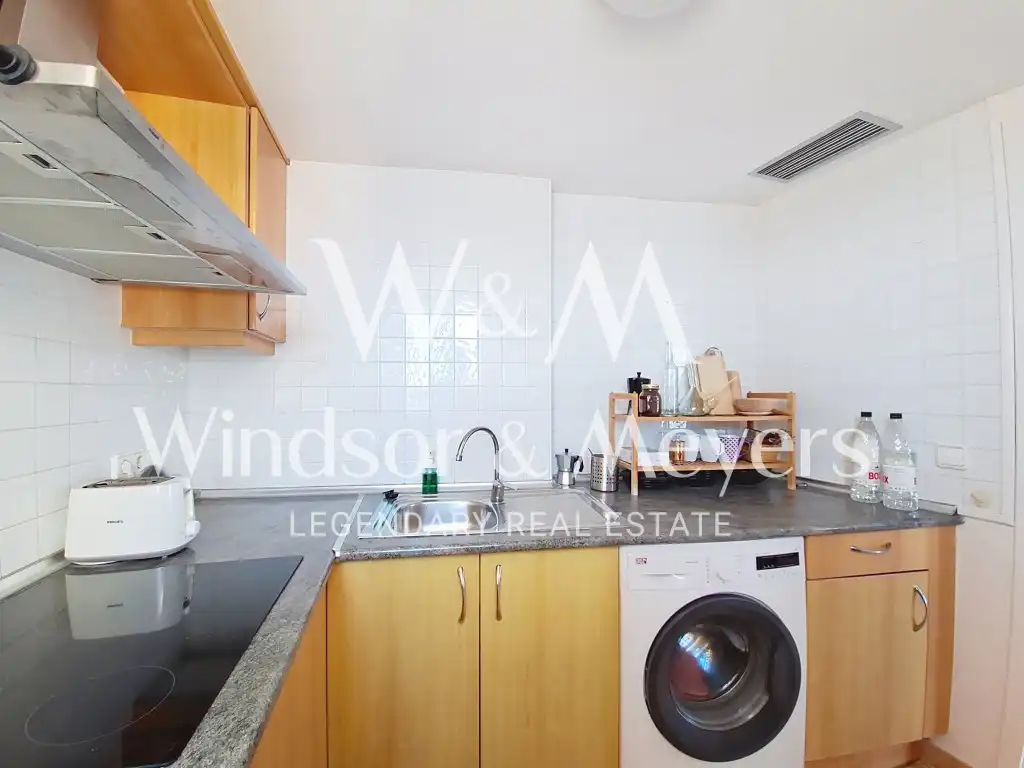 Cocina de Apartamento en venta en Santa Eulària des Riu con Aire acondicionado, Amueblado y Piscina comunitaria