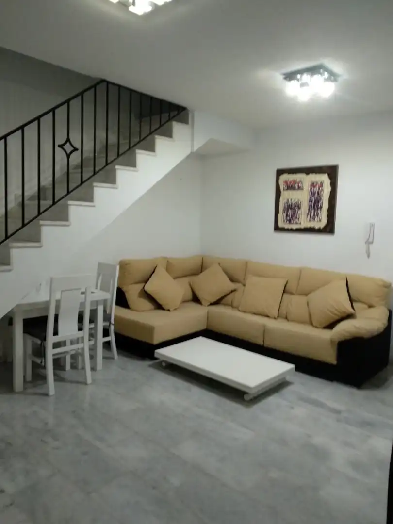 Sala de estar de Casa adosada en venta en Montilla con Aire acondicionado, Terraza y Trastero
