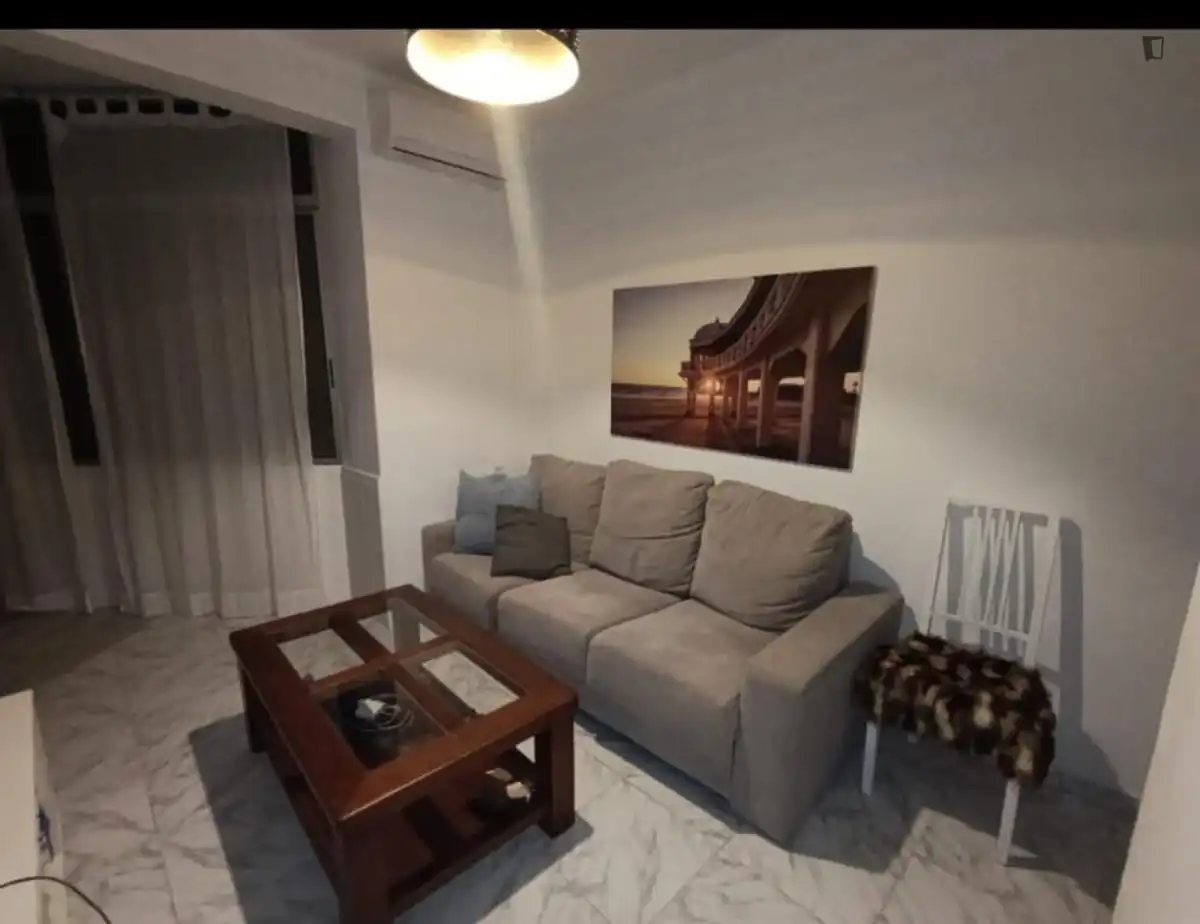 Sala d'estar de Apartament per a compartir en Sevilla amb Moblat, Rentadora i Internet