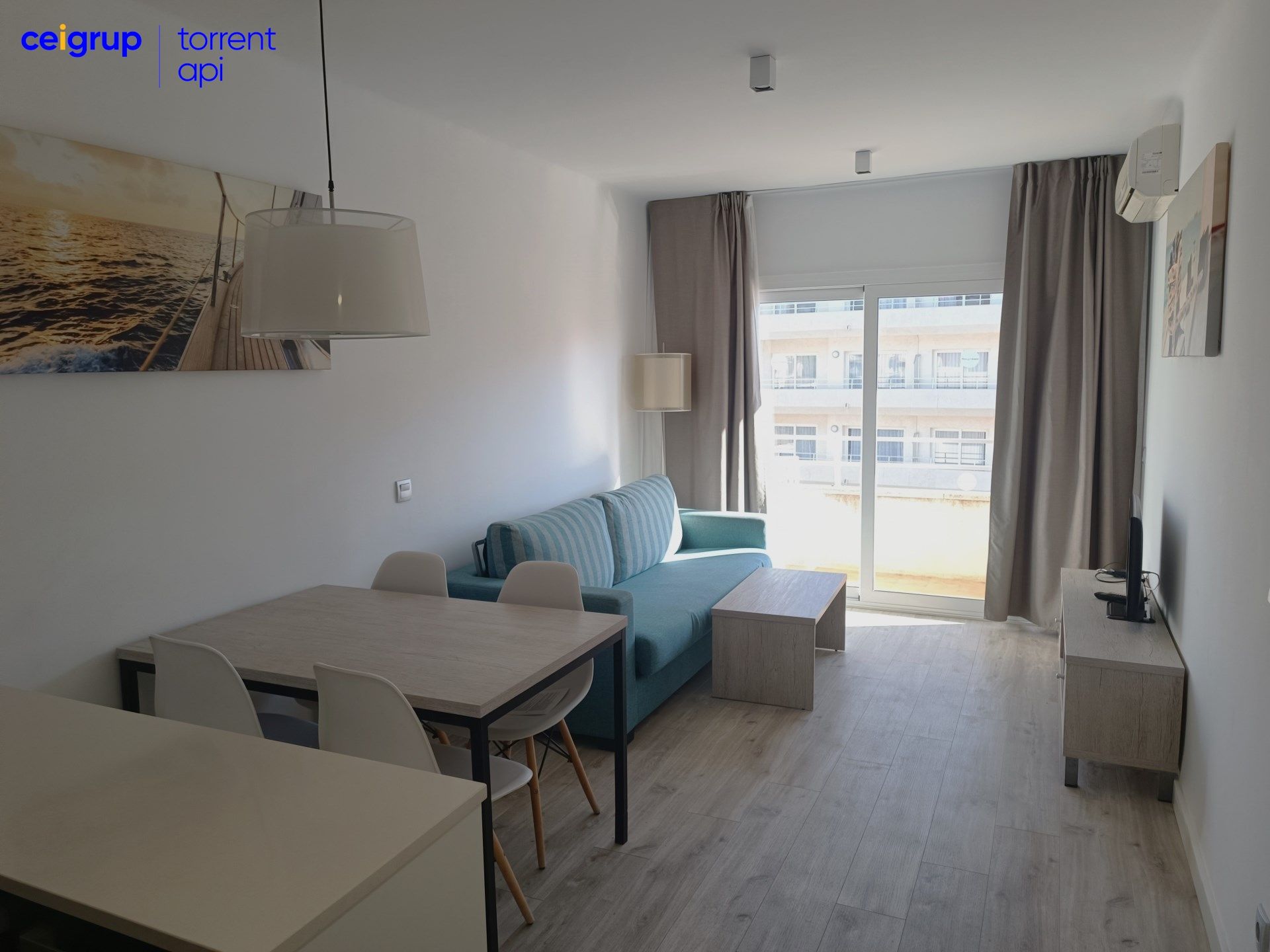 Sala d'estar de Pis de lloguer en L'Estartit amb Aire condicionat, Piscina i Moblat