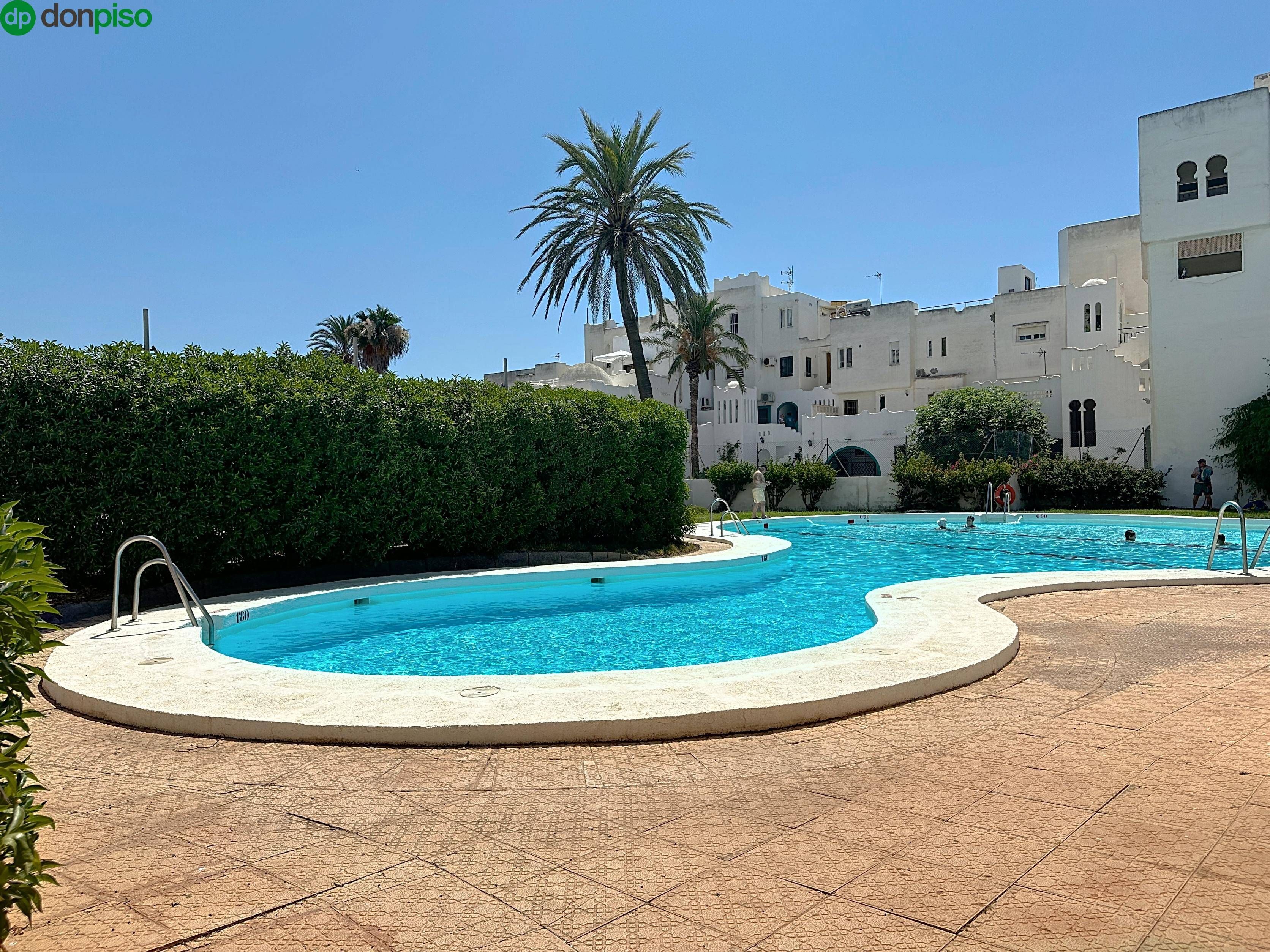 Swimming pool of Apartment for sale in Roquetas de Mar  with Private garden and Community pool