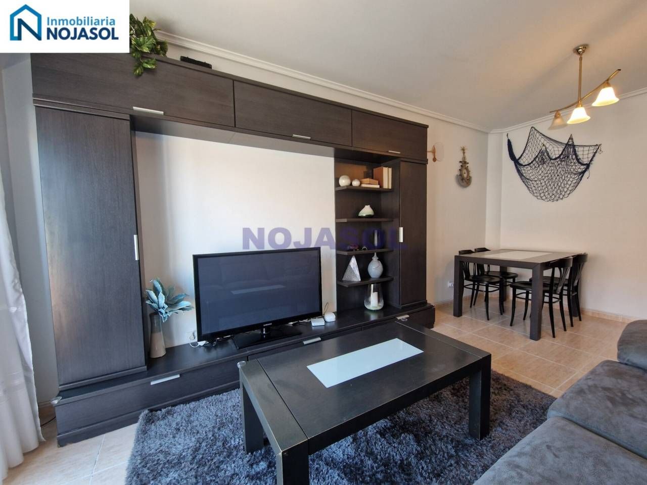 Sala d'estar de Apartament en venda en Noja amb Calefacció, Terrassa i Moblat