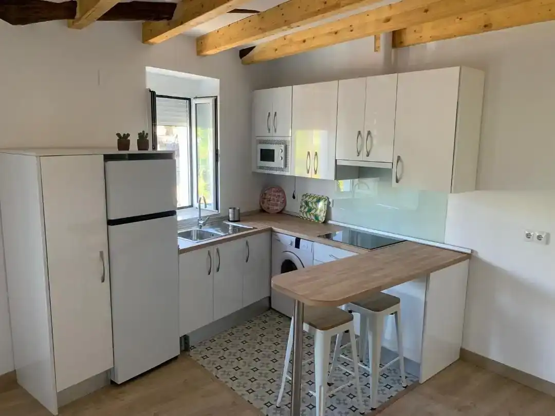 Cuina de Apartament de lloguer en Logrosán amb Aire condicionat, Parquet i Moblat