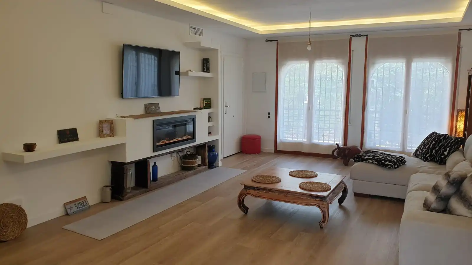 Sala de estar de Casa adosada en venta en Mont-roig del Camp con Aire acondicionado, Calefacción y Jardín privado