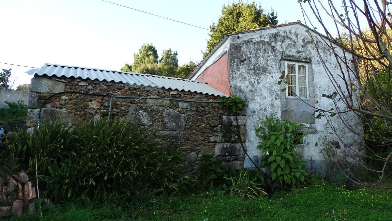 Exterior view of House or chalet for sale in A Pobra do Caramiñal  with Private garden