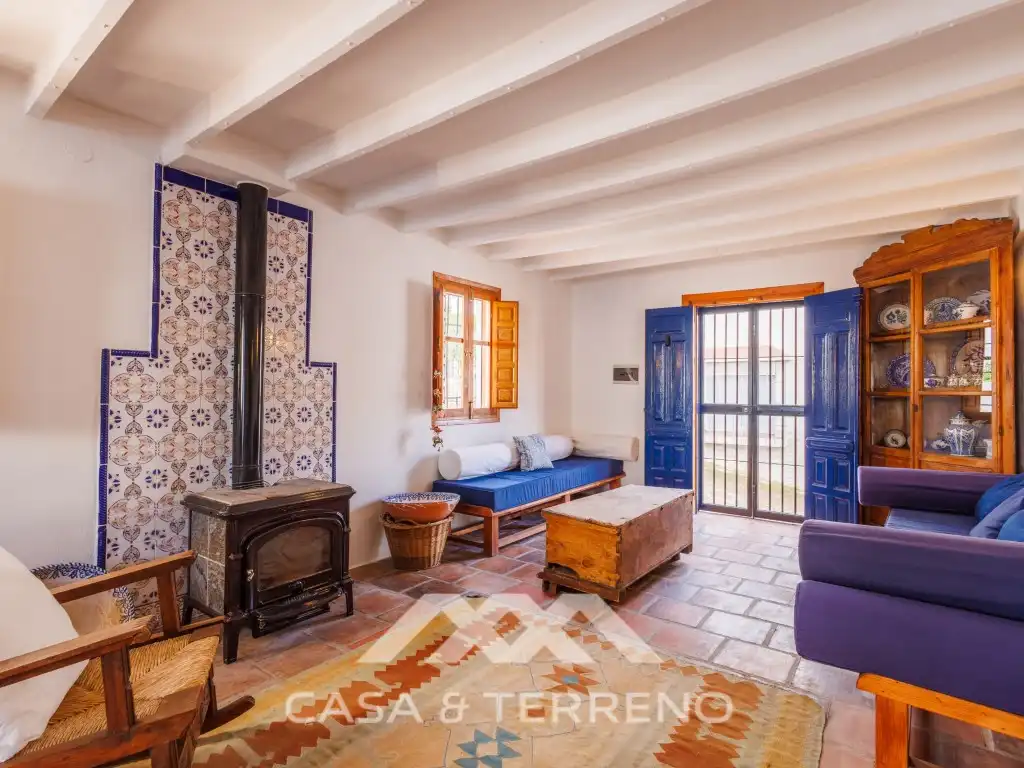 Sala de estar de Casa adosada en venta en Comares con Aire acondicionado, Terraza y Piscina