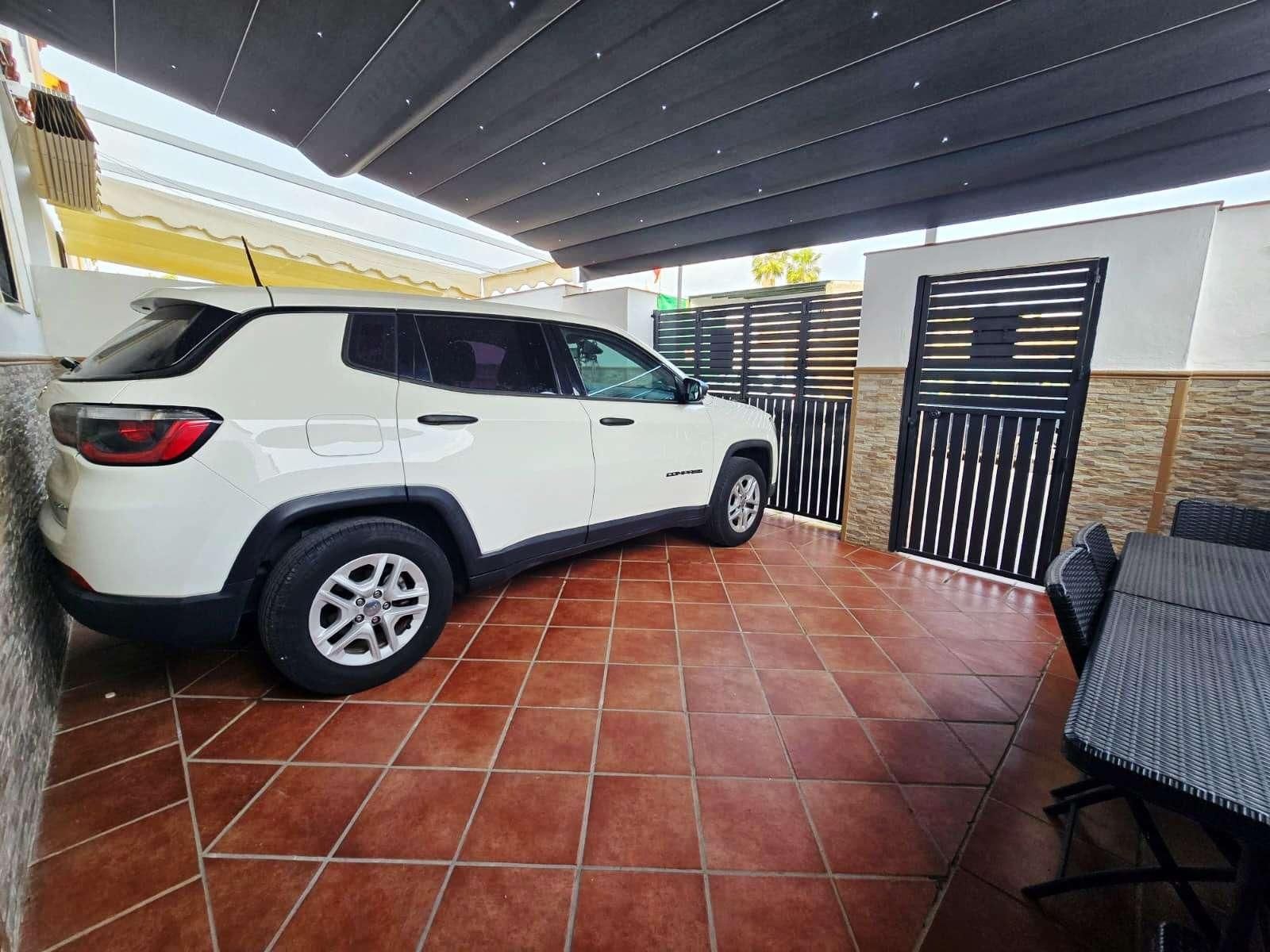 Parking de Casa adosada en venta en Bollullos de la Mitación con Aire acondicionado, Terraza y Trastero