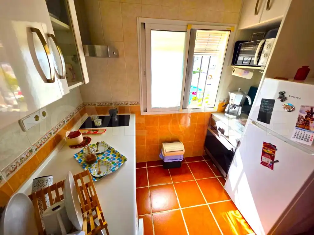 Cuina de Apartament en venda en Torremolinos amb Jardí privat, Piscina i Piscina comunitària