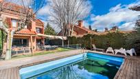 Swimming pool of Single-family semi-detached for sale in Pozuelo de Alarcón  with Air Conditioner, Heating and Private garden