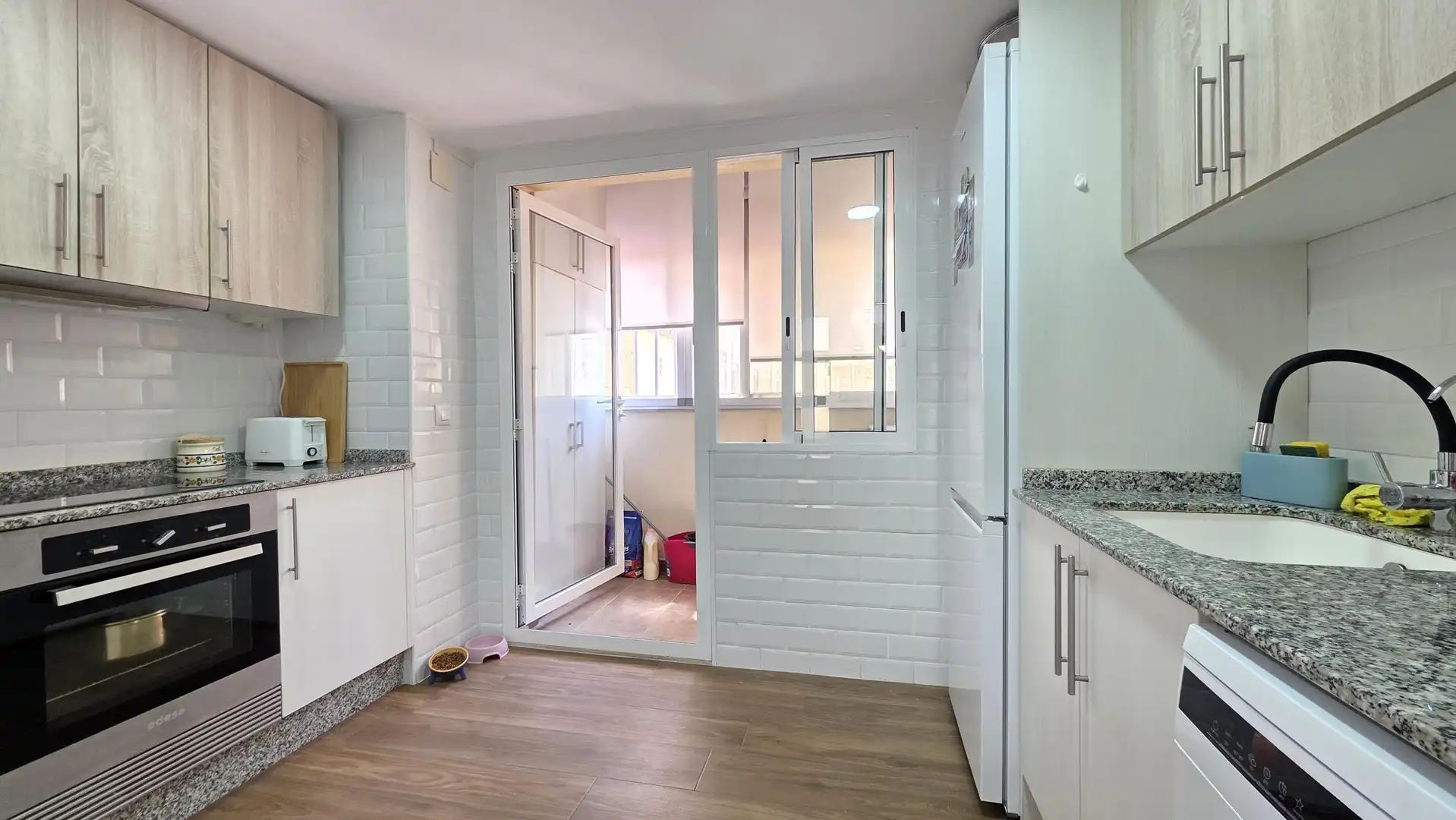 Kitchen of Flat for sale in Gandia  with Air Conditioner, Terrace and Balcony