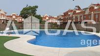 Swimming pool of Single-family semi-detached for sale in Dos Hermanas  with Terrace and Swimming Pool