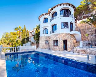 Vista exterior de Casa o xalet en venda en Moraira amb Aire condicionat, Terrassa i Piscina