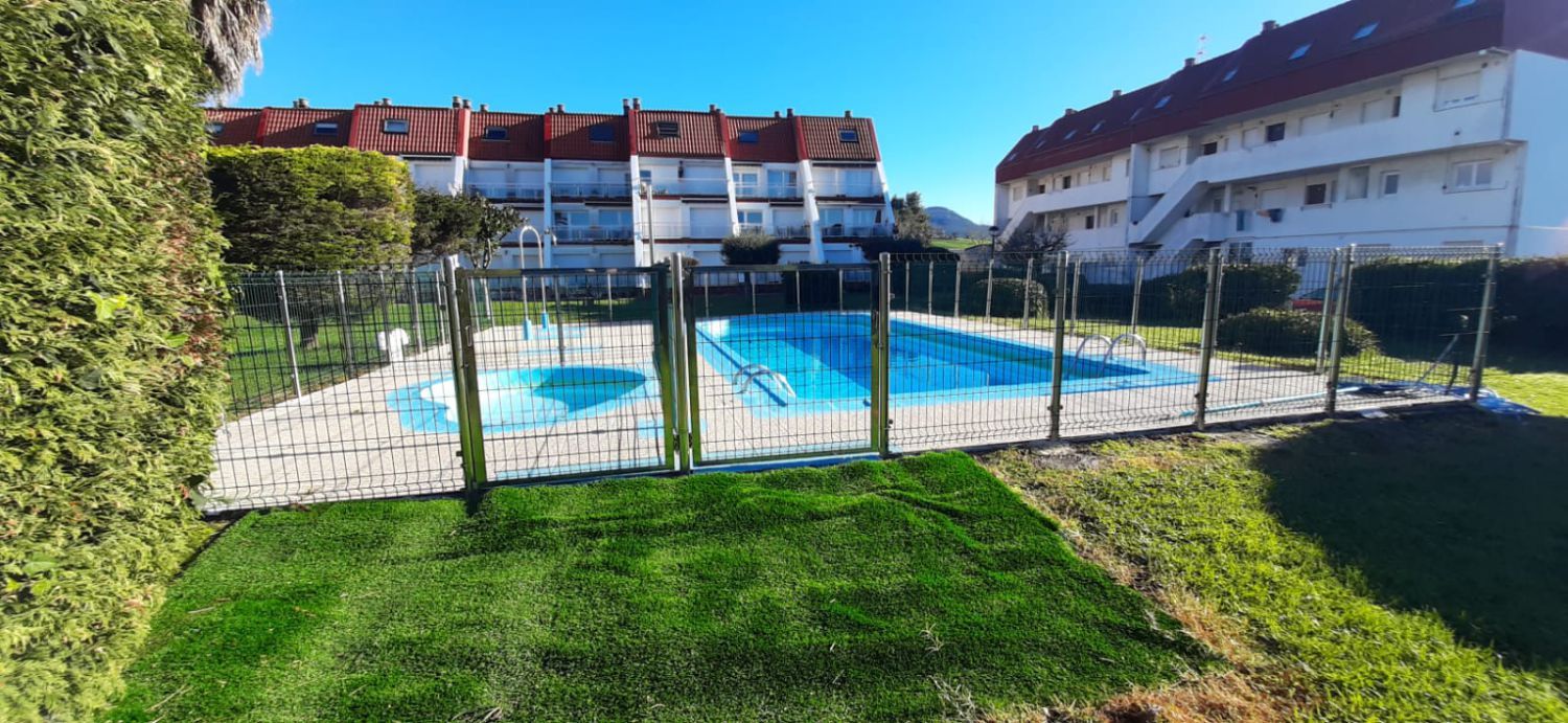 Swimming pool of Duplex for sale in Argoños   with Heating and Terrace