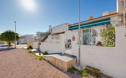 Exterior view of Single-family semi-detached for sale in Torrevieja  with Air Conditioner, Private garden and Terrace