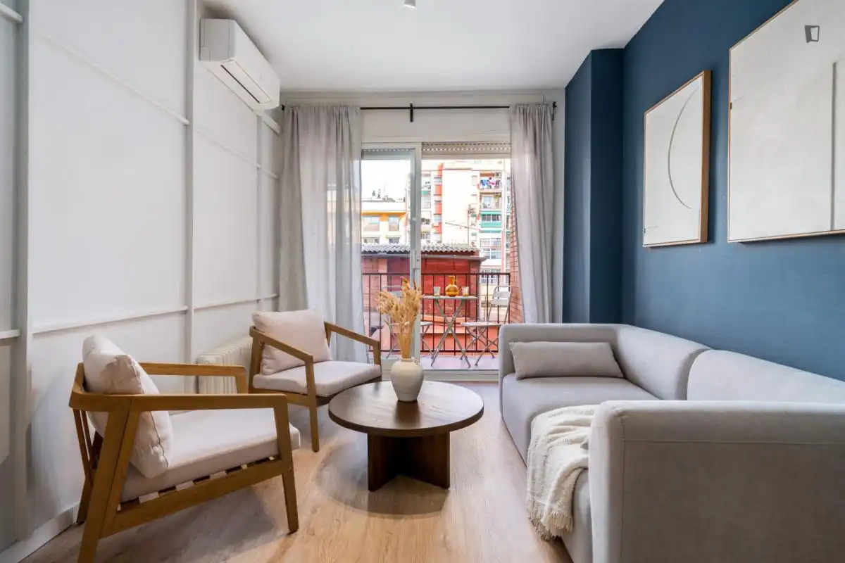 Sala de estar de Apartamento para compartir en Barcelona con Aire acondicionado, Calefacción y Amueblado