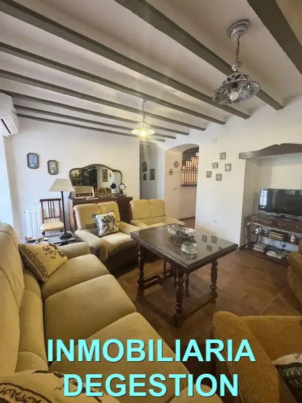 Sala de estar de Casa adosada en venta en Guarromán con Aire acondicionado, Calefacción y Jardín privado