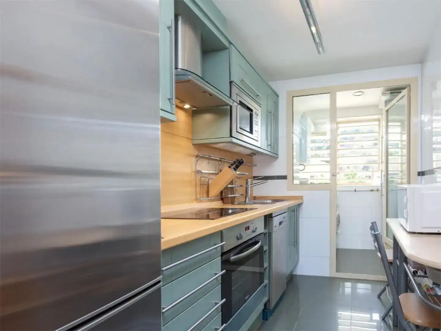 Küche von Wohnung zum Verkauf in Málaga Capital mit Klimaanlage, Schwimmbad und Balkon