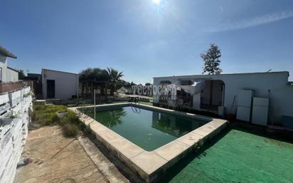 Swimming pool of Country house for sale in Utrera