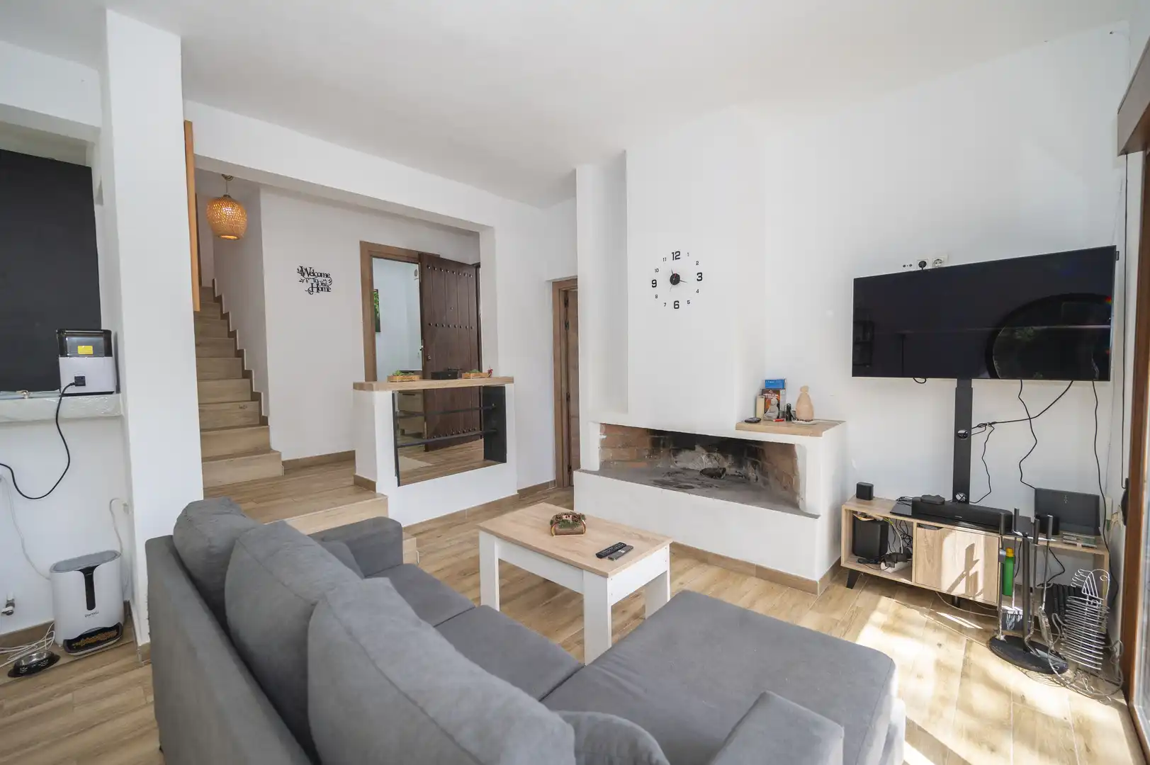 Sala de estar de Casa adosada en venta en Santa Eulària des Riu con Aire acondicionado y Calefacción