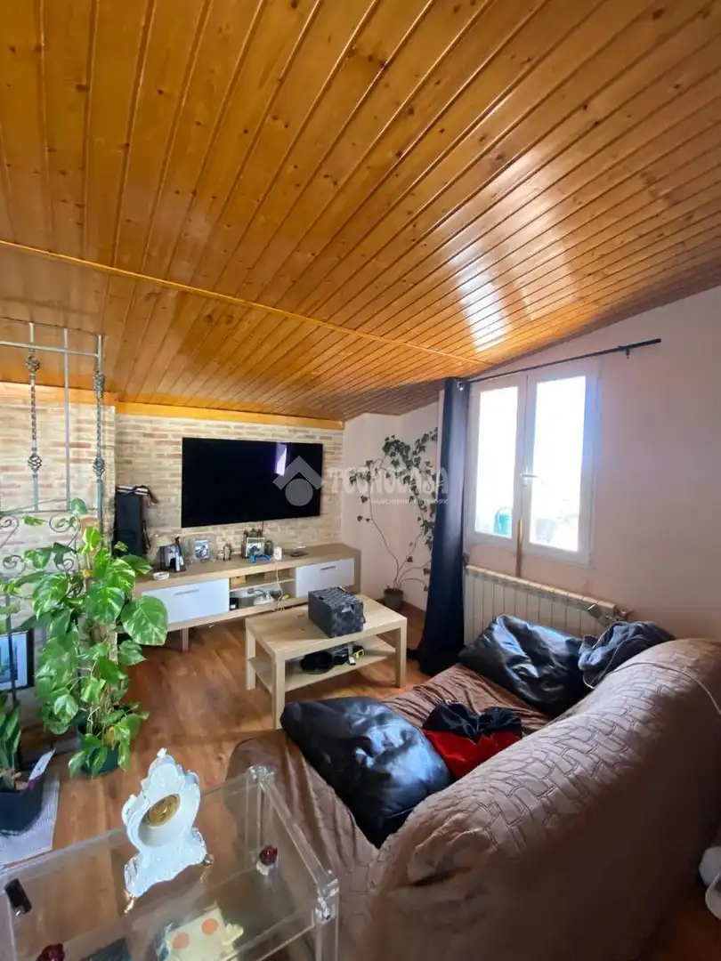 Sala d'estar de Casa adosada en venda en Alaminos amb Terrassa